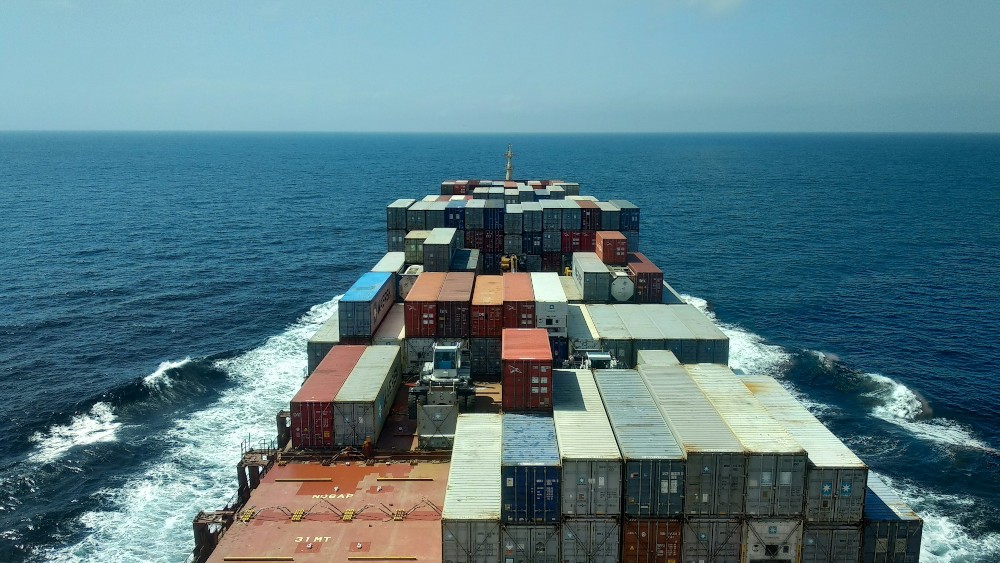 Scaling container ship representing modern software supply chains